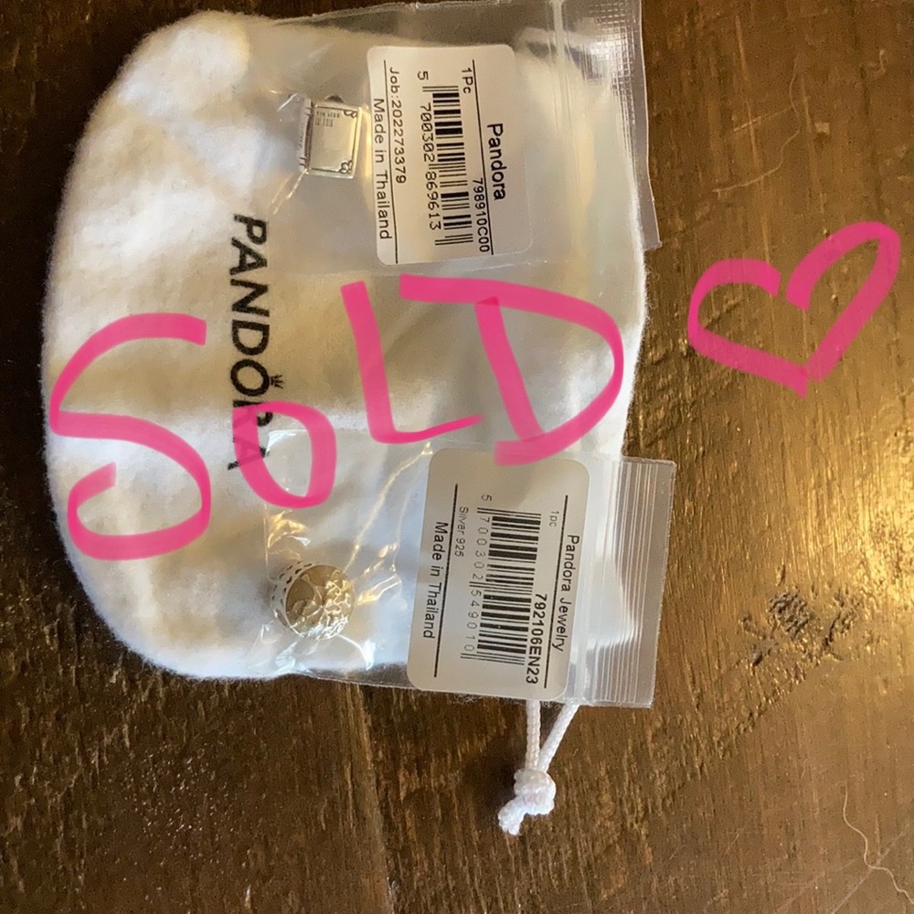 Two Pandora charms